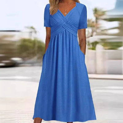 Delilah™ | Robe midi avec couture à la taille et poches