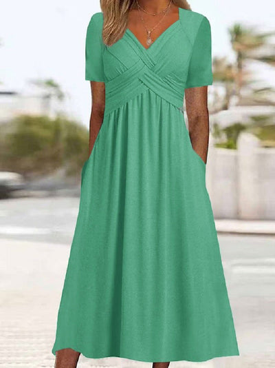 Delilah™ | Robe midi avec couture à la taille et poches
