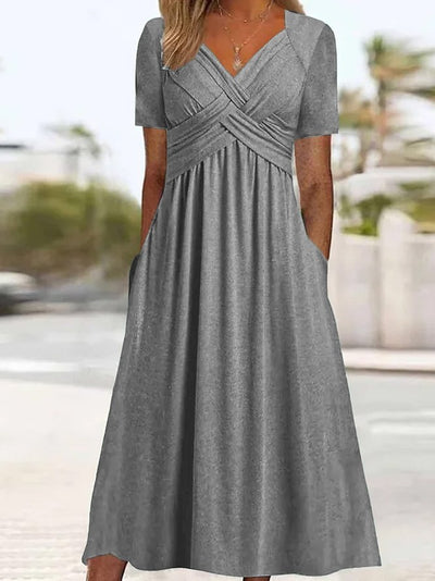 Delilah™ | Robe midi avec couture à la taille et poches
